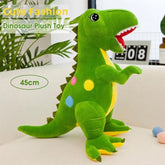 Green dinosaur plush toy on a white surface with text indicating size and description.